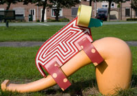 The legendary bull of Genemuiden sitting on  pipe, Leo I, in Genemuiden